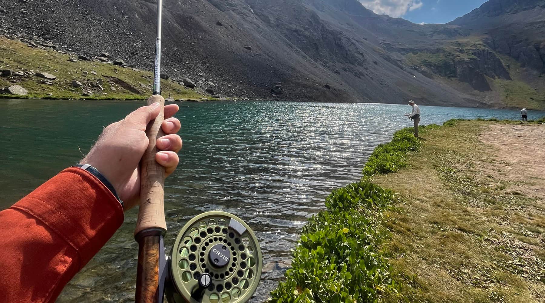 Alpine lake in the San Juan Mountains under the sun