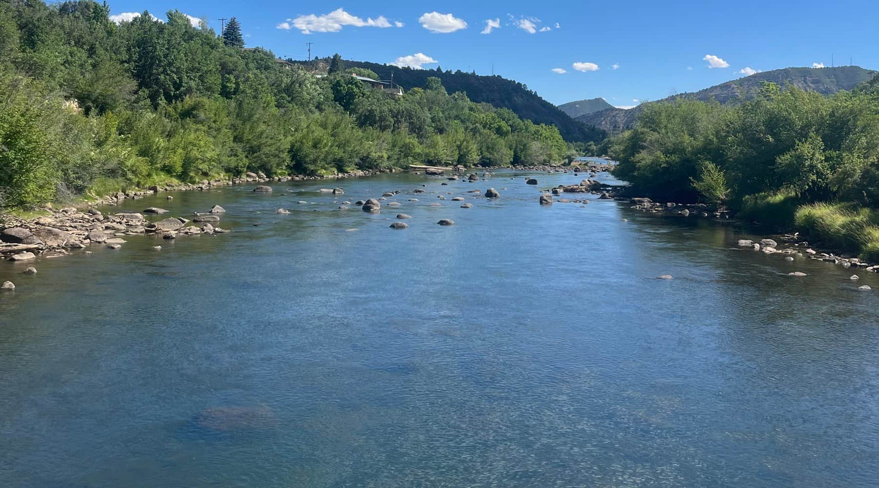 River under building clouds near Durango, Colorado